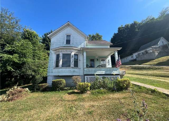 Property at 302 E High St, Uhrichsville, OH 44683, 4 beds, 1 bath