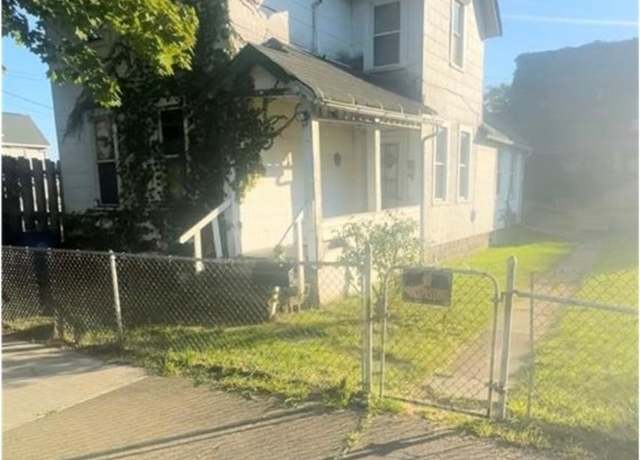 Property at 4809 Fenwick Ave, Cleveland, OH 44102, 7 beds, 3 baths
