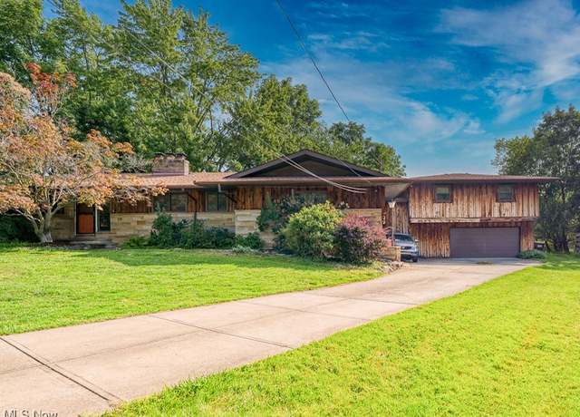 Property at 7509 N Linden Ln, Parma, OH 44130, 4 beds, 3 baths