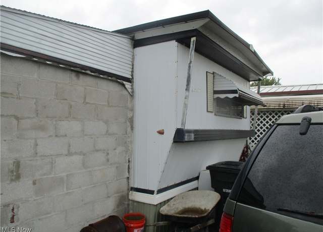Property at 8209 Russell Ln, Cleveland, OH 44144, 2 beds, 1 bath