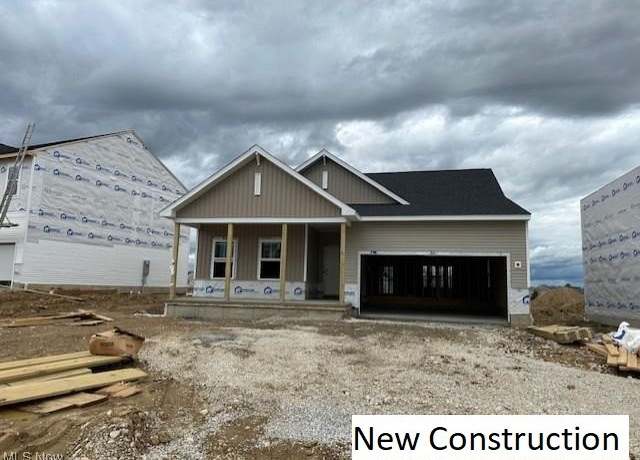 Property at 2993 Mcintosh Dr NE, Louisville, OH 44641, 4 beds, 2 baths