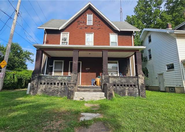 Property at 1338 Maple Ave NE, Canton, OH 44705, 3 beds, 2 baths