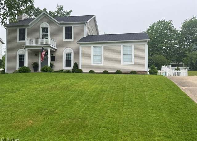Property at 10957 Mogadore Ave NW, Uniontown, OH 44685, 4 beds, 2.5 baths