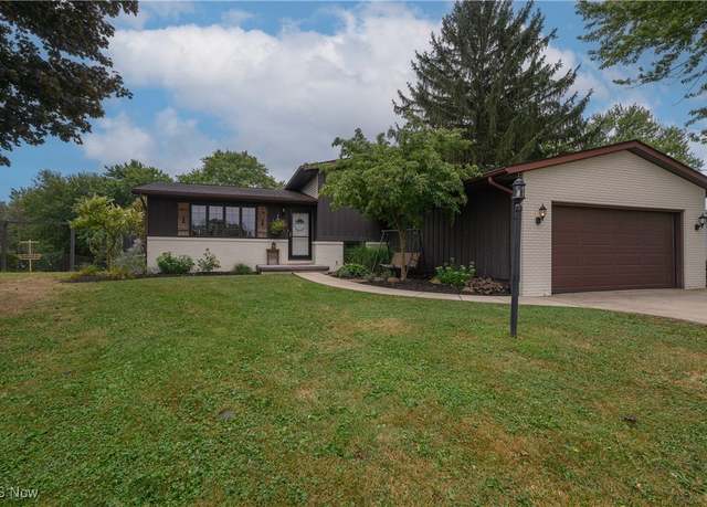 Property at 10299 Hunting Hills Ave NE, Hartville, OH 44632, 3 beds, 2 baths