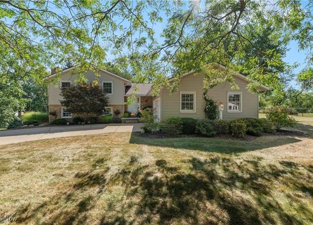 Property at 11558 Lela Ave NW, Uniontown, OH 44685, 4 beds, 2.5 baths
