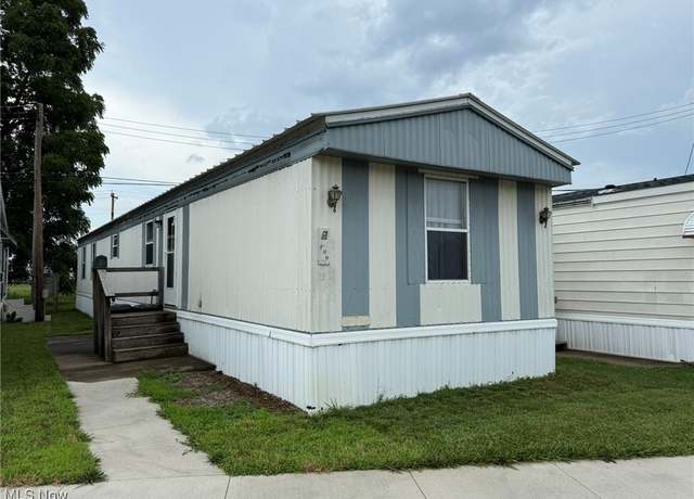 Property at 809 Zella Ave NW, New Philadelphia, OH 44663, 2 beds, 2 baths
