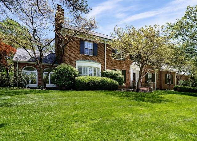 Property at 1410 Woodstock Dr, Oakwood, OH 45419, 5 beds, 4 baths