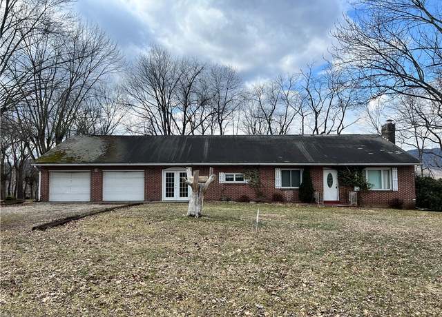Property at 610 Olive St, St Clair Twp, PA 15954, 3 beds, 2.5 baths
