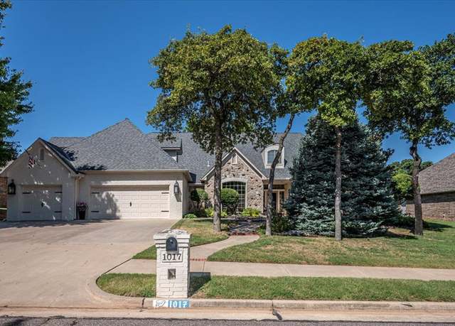 Property at 1017 Gulmor Dr, Edmond, OK 73034, 4 beds, 3.5 baths