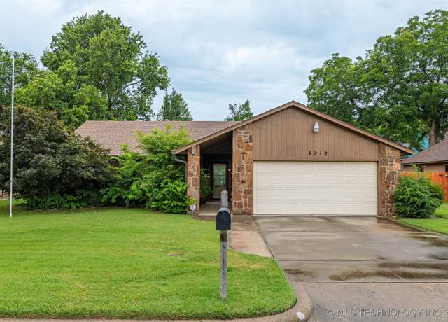 Property at 6212 S Troost Ave, Tulsa, OK 74136, 3 beds, 2 baths