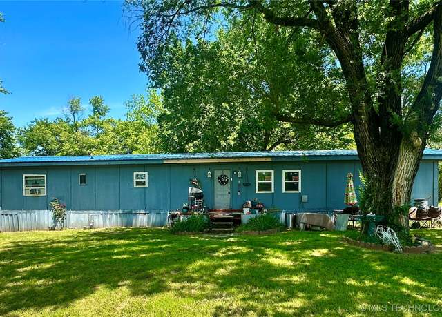 Property at 310 E Audd Ave, Checotah, OK 74426, 2 beds, 2 baths