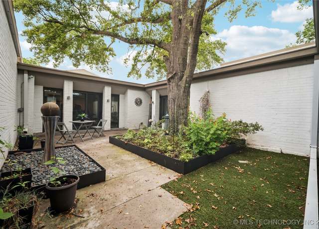 Property at 2411 E 72nd Pl Unit 2-A-3, Tulsa, OK 74136, 2 beds, 2.5 baths