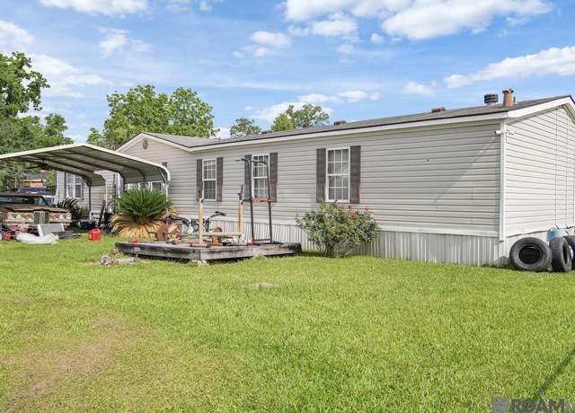 Property at 806 S Quiett Ave, Gonzales, LA 70737, 4 beds, 2 baths