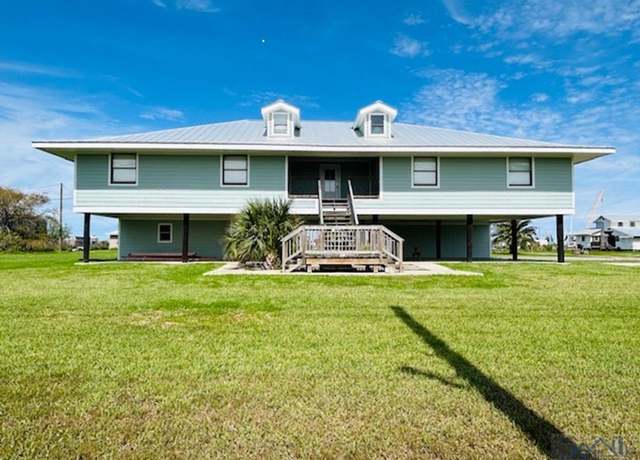 Property at 215 Louisiana Ave, Grand Isle, LA 70358, 7 beds, 3 baths