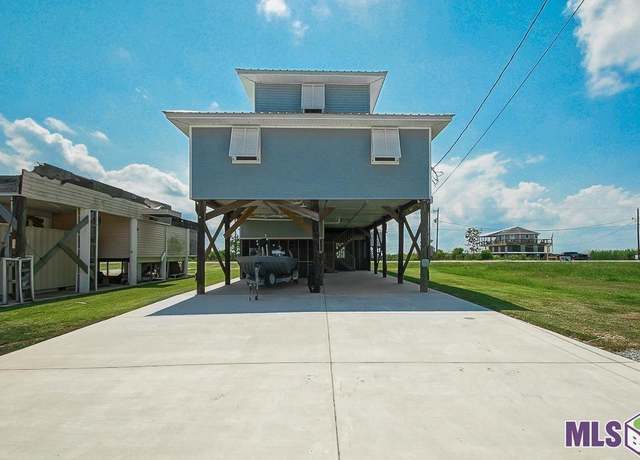 Property at 119 Lillian Ln, Chauvin, LA 70344, 4 beds, 4.5 baths