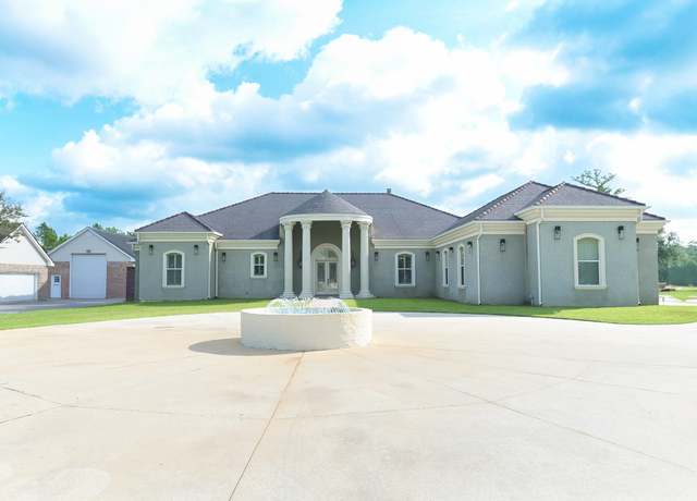 Property at 113 Ouiski Bayou Dr, Houma, LA 70360, 7 beds, 5.5 baths
