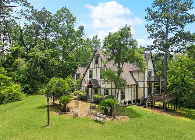 Property at 250 Ponchitolawa Dr, Covington, LA 70433, 5 beds, 5.5 baths