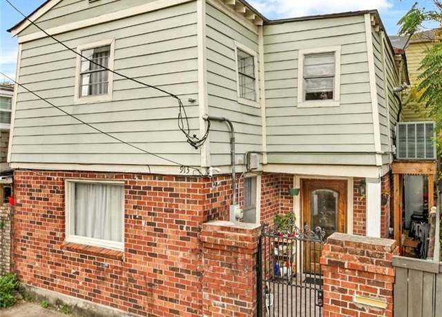 Property at 913 Harmony St, New Orleans, LA 70115, 4 beds, 1.5 baths