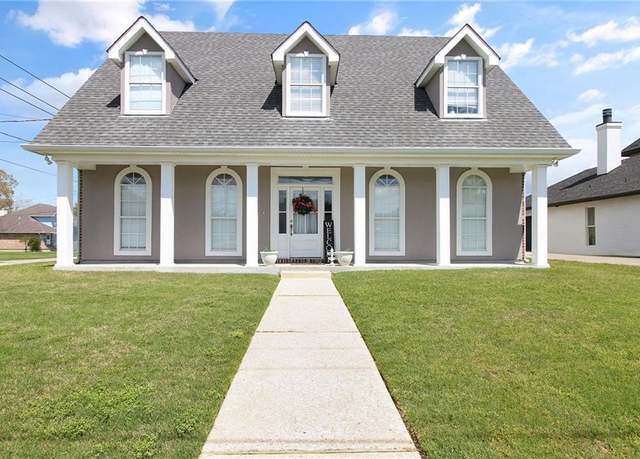 Property at 701 Cazalard St, Belle Chasse, LA 70037, 4 beds, 3 baths
