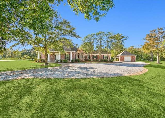 Property at 13 Parc Riverwood Dr, Belle Chasse, LA 70037, 4 beds, 3.5 baths