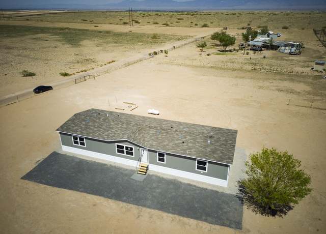 Property at 297 Harrison Rd, Belen, NM 87002, 5 beds, 3 baths