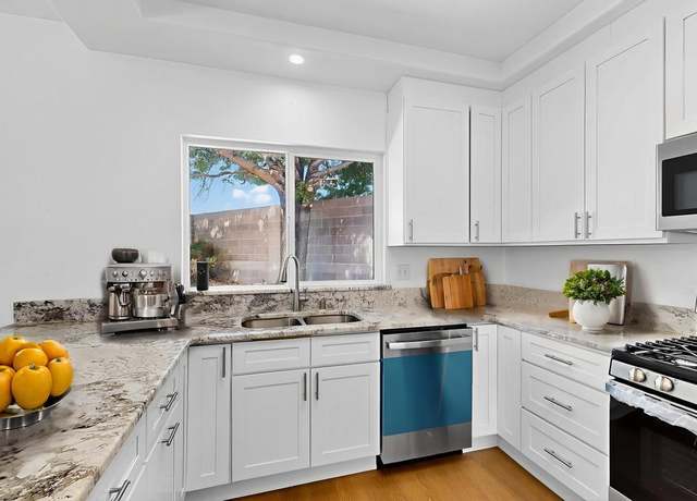 Property at 6912 Rancho Vista Pl NE, Albuquerque, NM 87113, 4 beds, 2 baths