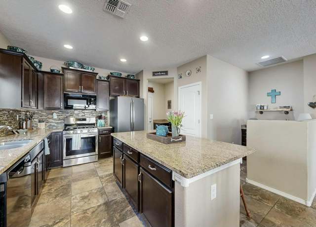 Property at 9631 Iron Rock Dr NW, Albuquerque, NM 87114, 3 beds, 2.5 baths