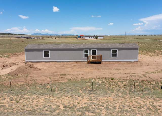 Property at 77 Sky Loop, Moriarty, NM 87035, 4 beds, 2 baths