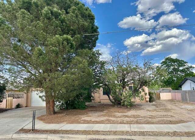Property at 10704 Olympic St NW, Albuquerque, NM 87114, 3 beds, 2 baths