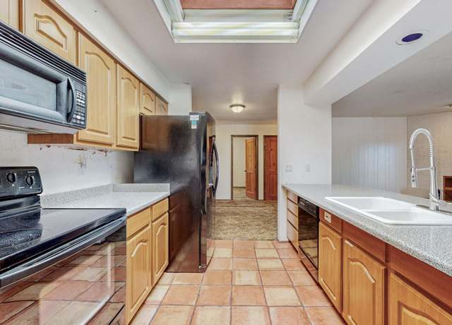 Property at 9308 Spain Rd NE, Albuquerque, NM 87111, 4 beds, 2 baths