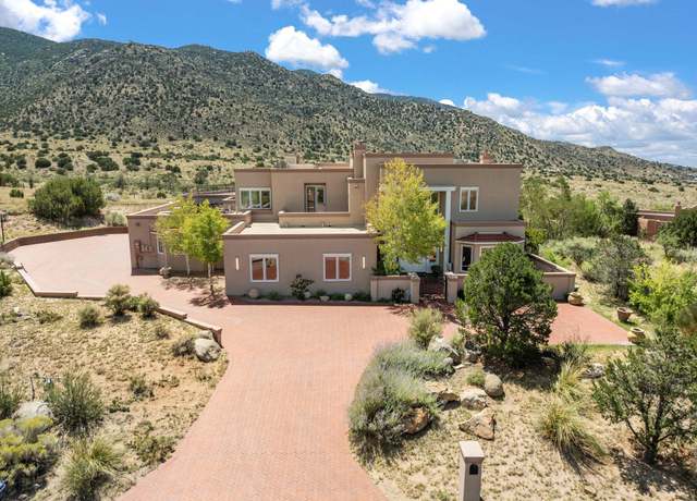 Property at 13716 Canada Del Oso Pl NE, Albuquerque, NM 87111, 6 beds, 8.5 baths