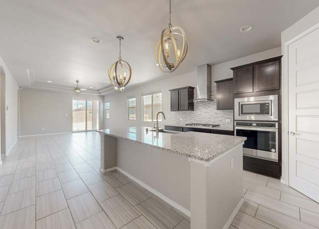 Property at 415 Adeline Ave, Los Lunas, NM 87031, 4 beds, 2 baths