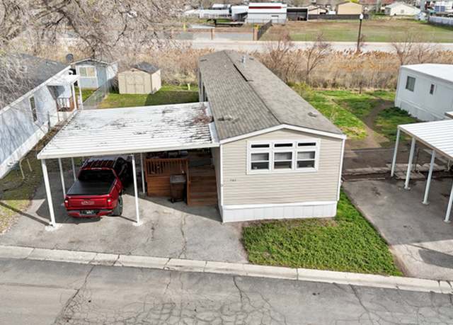 Property at 7142 W Apaloosa Dr, West Valley City, UT 84128, 3 beds, 2 baths