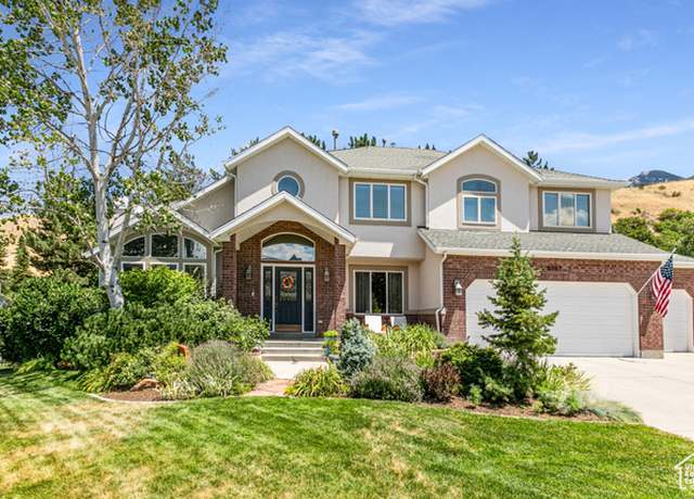 Property at 8967 S Cobble Canyon Ln, Sandy, UT 84093, 7 beds, 4.5 baths