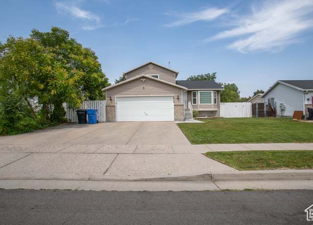 Property at 4918 W 6110 S, Kearns, UT 84118, 5 beds, 2.5 baths