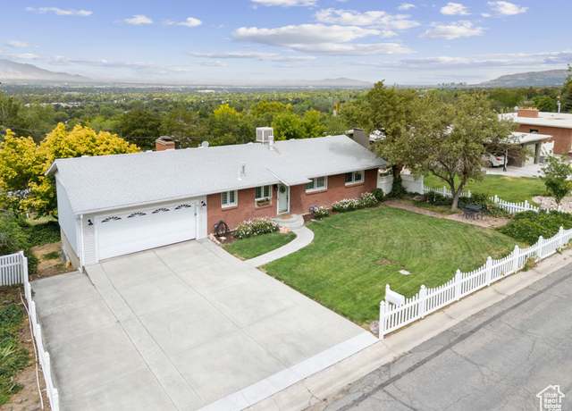 Property at 4702 S Stratton Dr, Holladay, UT 84117, 4 beds, 3 baths