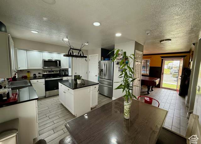 Property at 4076 S Mountain Moon Dr, Saratoga Springs, UT 84045, 7 beds, 3 baths