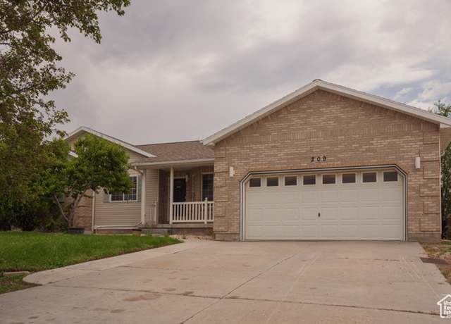 Property at 209 Country Club Dr, Stansbury Park, UT 84074, 6 beds, 3.5 baths