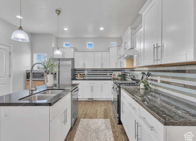 Property at 3877 S 1655 W, West Valley City, UT 84119, 4 beds, 2.5 baths