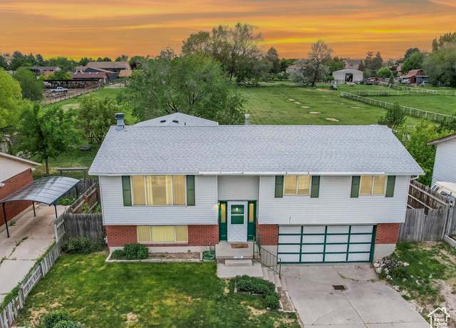 Property at 7109 W Chula Dr, West Valley City, UT 84128, 4 beds, 2 baths