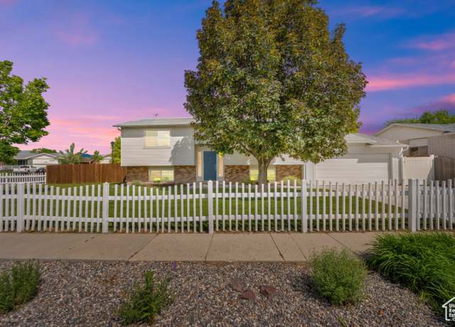 Property at 4033 S Burningham Dr, West Valley City, UT 84119, 4 beds, 2 baths