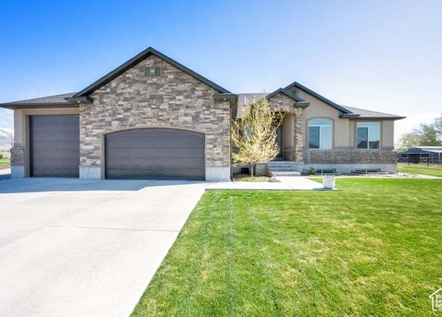 Property at 302 Old Farm Rd, Erda, UT 84074, 6 beds, 3 baths