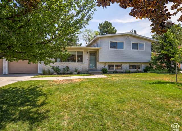 Property at 9257 S Quail Hollow Dr, Sandy, UT 84093, 4 beds, 2 baths