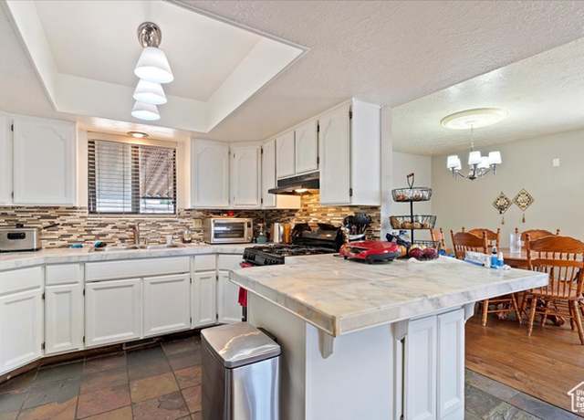 Property at 626 W 800 St N, Clinton, UT 84015, 4 beds, 3 baths
