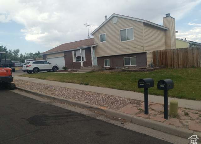 Property at 6215 S Westbrook Dr W, Taylorsville, UT 84129, 4 beds, 2 baths