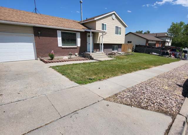Property at 6215 S Westbrook Dr W, Taylorsville, UT 84129, 4 beds, 2 baths