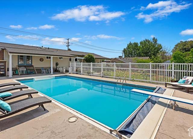 Property at 1154 W 1700 S, Syracuse, UT 84075, 4 beds, 3 baths
