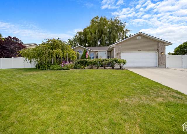 Property at 5149 W Village Wood Dr, West Valley City, UT 84120, 5 beds, 3 baths