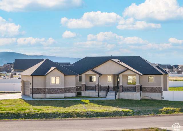 Property at 8177 N Spring Valley Ln Ln, Lake Point, UT 84074, 5 beds, 3.5 baths