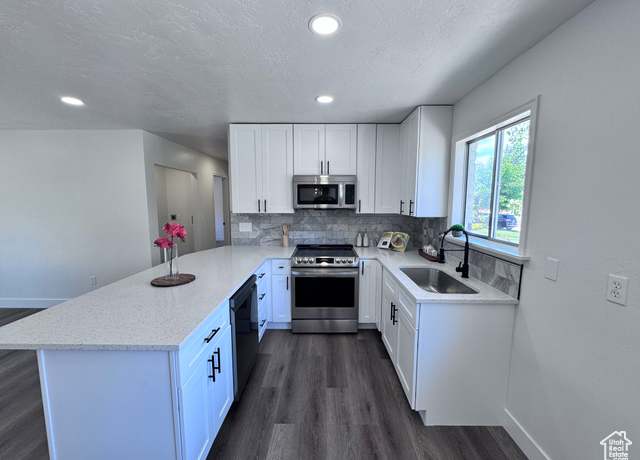 Property at 5135 W 4170 S, West Valley City, UT 84120, 5 beds, 3 baths